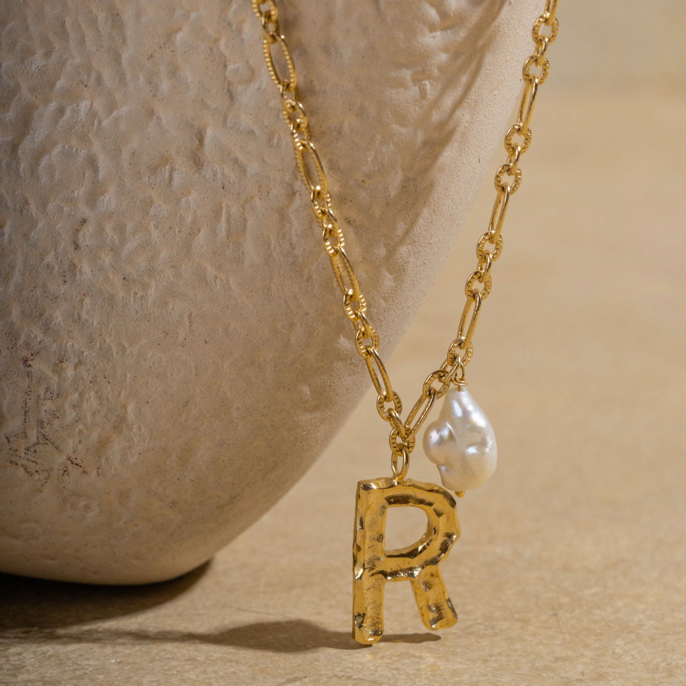 R-Initial